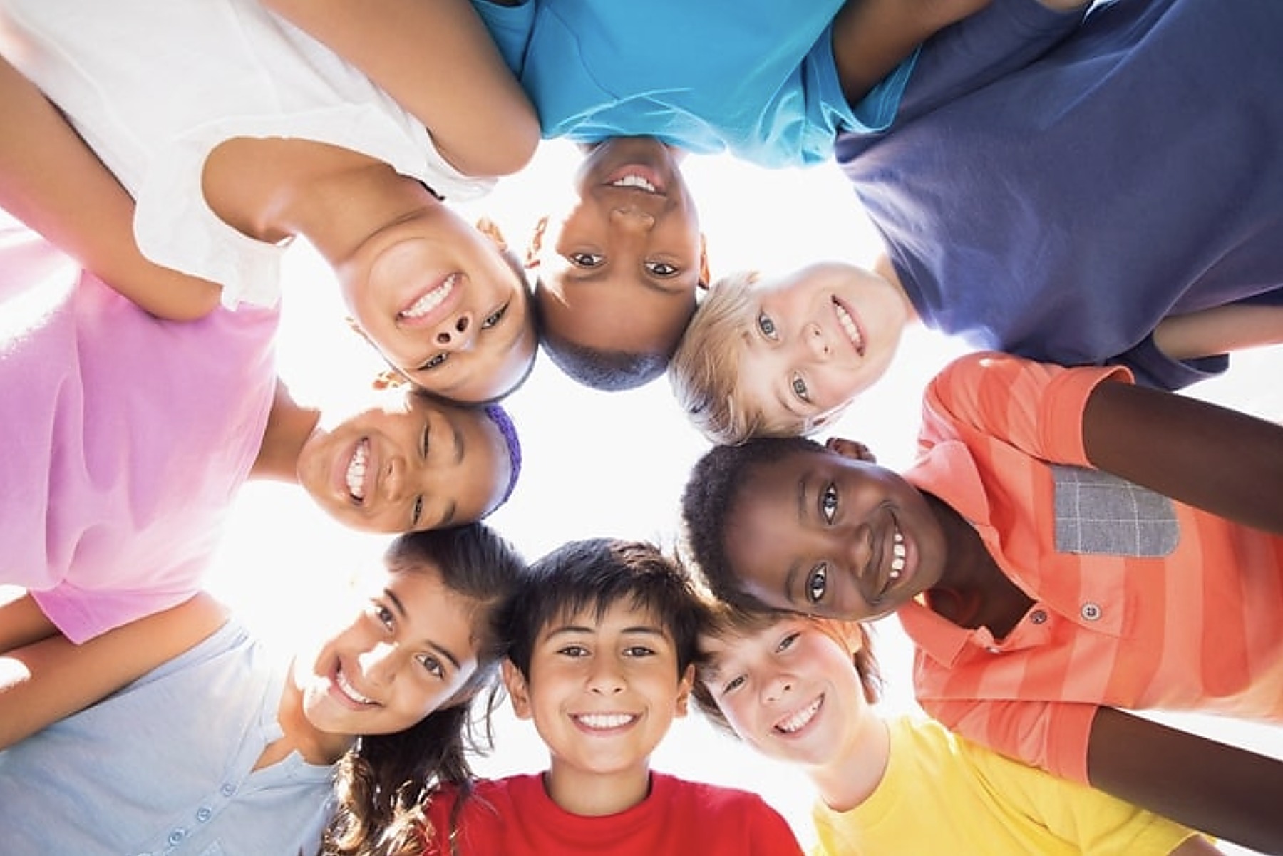 A joyful, multicultural group of children ready to join the movement