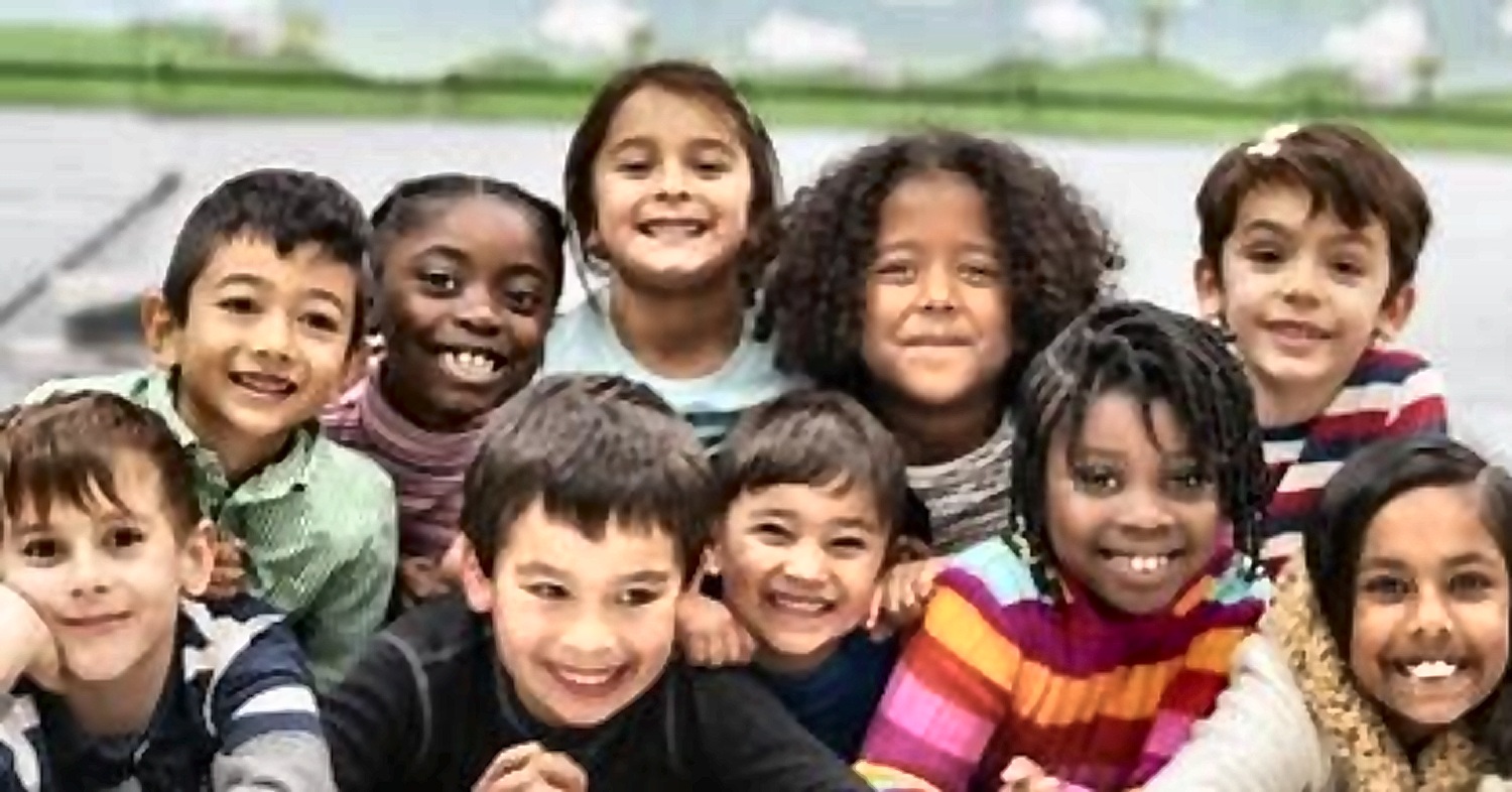 Students smiling in a classroom
